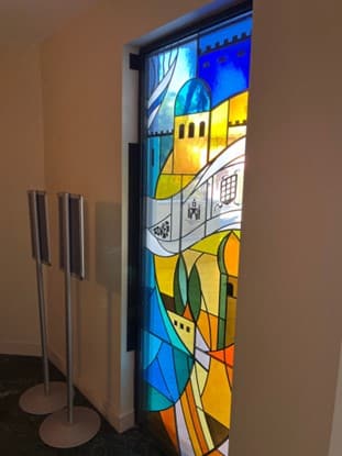 Bullet Proof Laminate Installed on Stained Glass